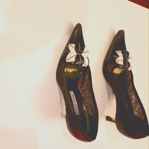 Black and white  female beautiful Luciano Padovan shoes.